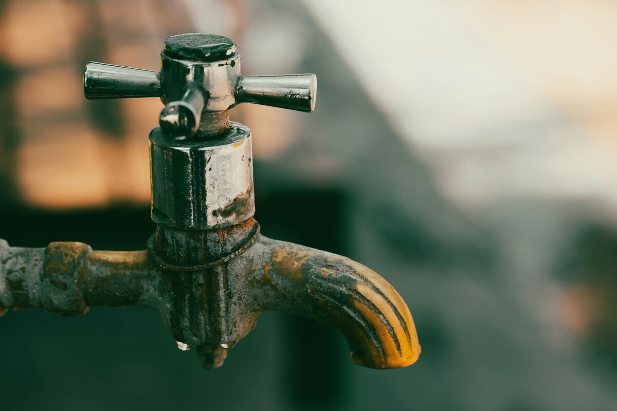 Limescale deposits on a kitchen tap in an Australian home, typical of the hardest water suburbs in Australia