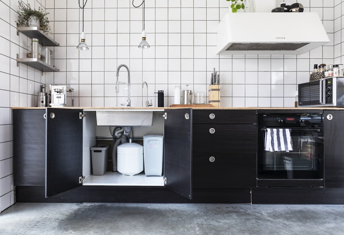 Under-sink water filter installed in an Australian kitchen, a common setup when choosing the best water filter in Australia