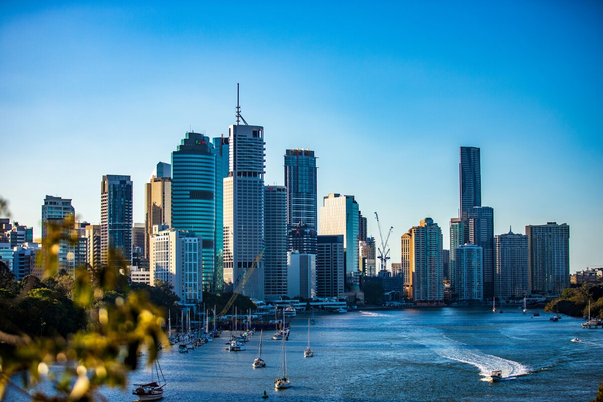 Brisbane skyline and river at sunset, representing Brisbane's moderately hard tap water supply from Seqwater catchments