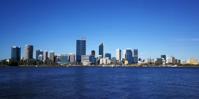 Perth and Adelaide city skylines representing two Australian cities known for their harder tap water compared to the eastern capitals