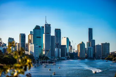 Brisbane city skyline and Brisbane River on a clear day, where water hardness varies across suburbs depending on supply zone