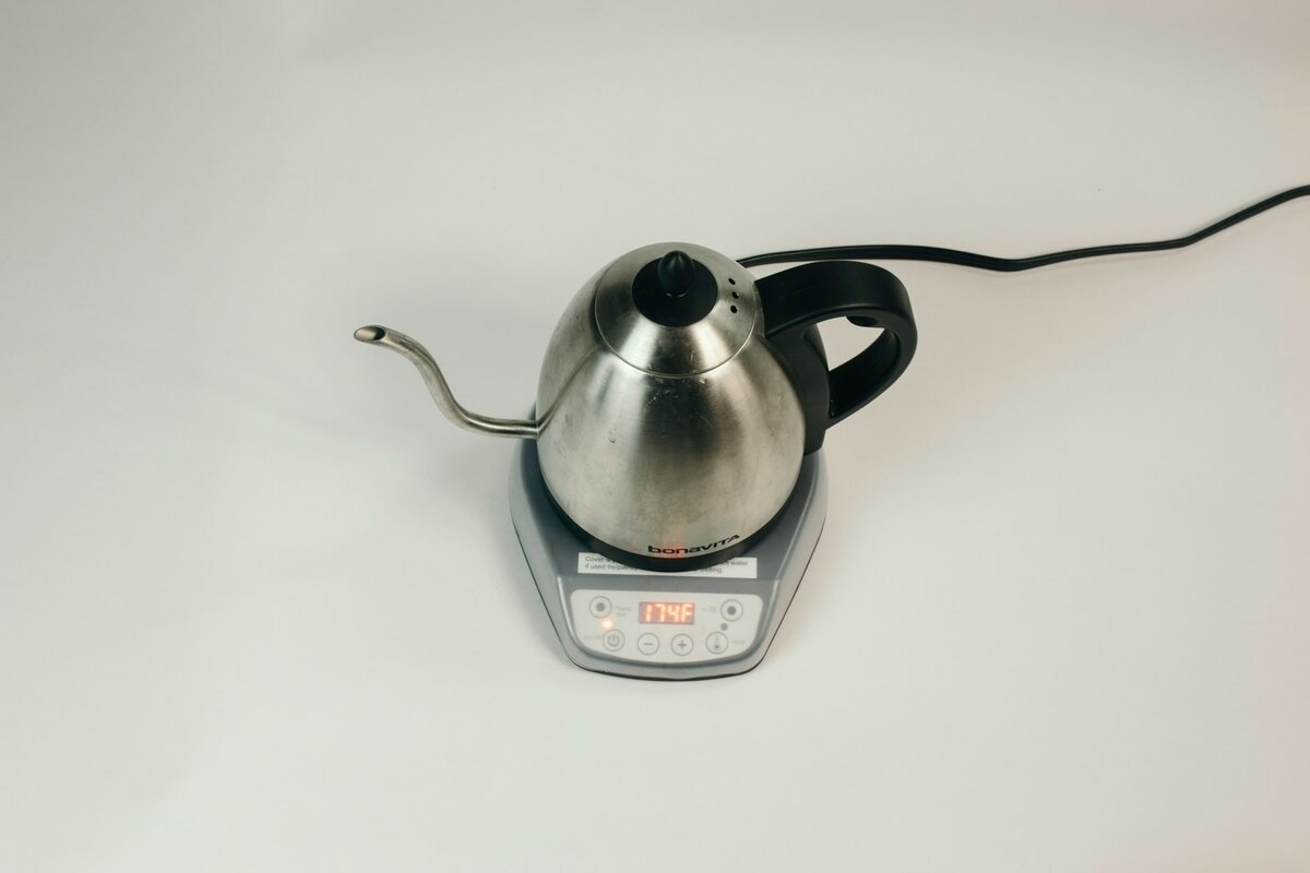 White limescale residue at the bottom of an electric kettle caused by hard water minerals in Australian tap water